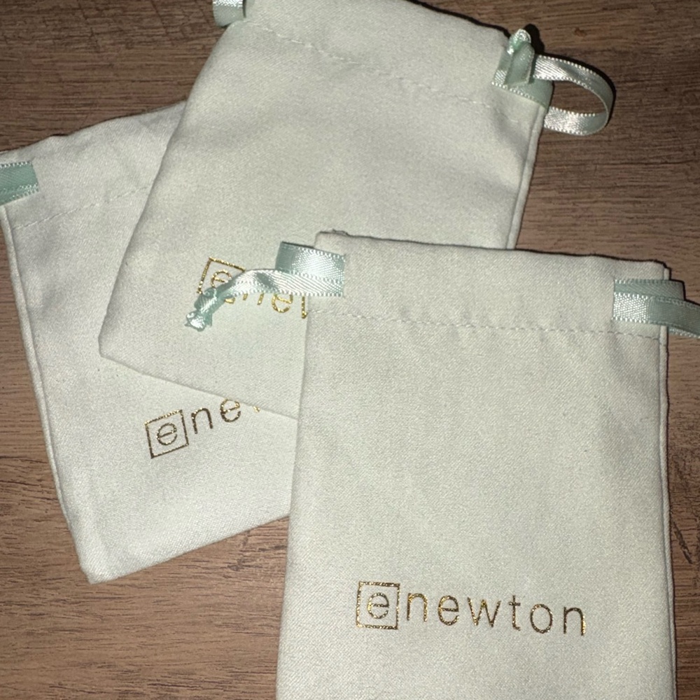 Enewton Cream Jewelry Pouch with Gold Logo